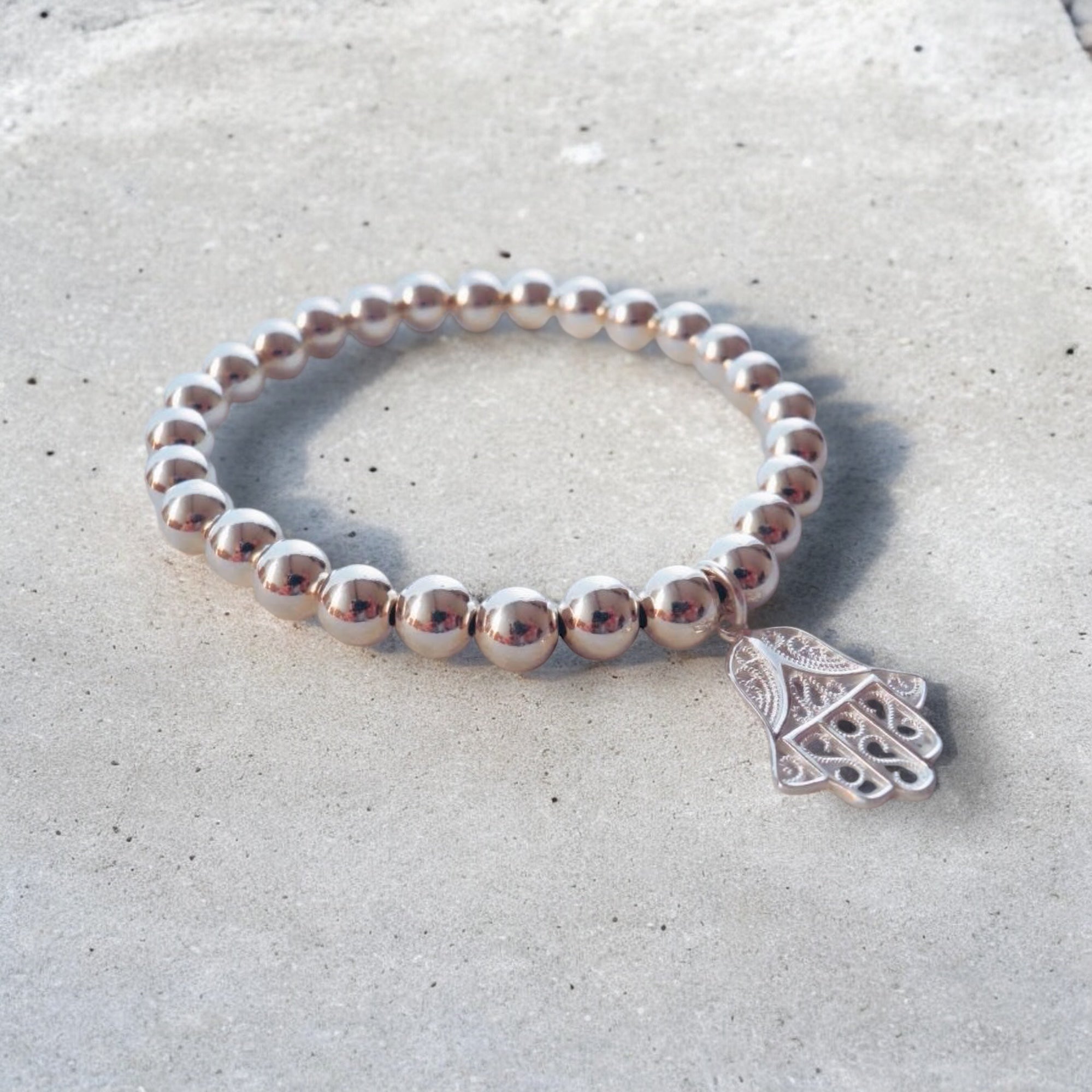 Elastisches 925 Silber Kugel Armband mit "Hand of Fatima" Anhänger